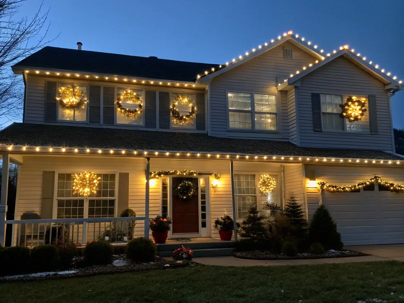 A residential home in Calgary illuminated with Govee Outdoor PRO lights, highlighting the garage peak and creating a warm and inviting ambiance.
